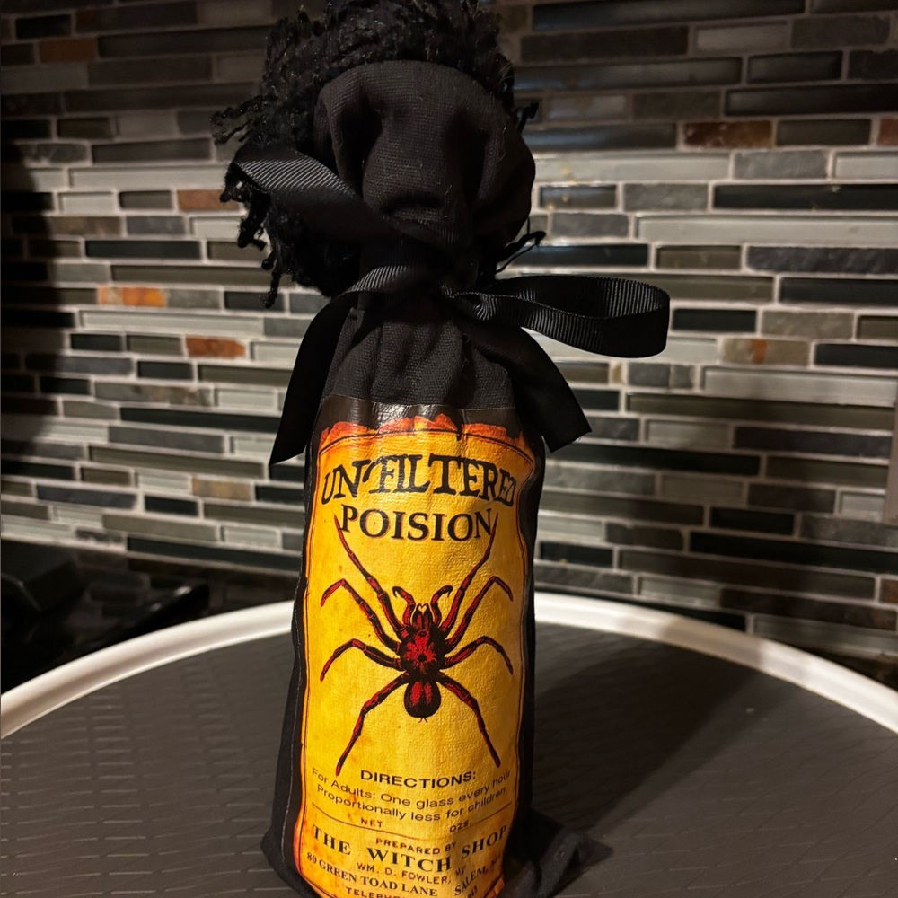 Black Decorative Wine Bottle Bag with spider design. Cauldron brew bottle wraps